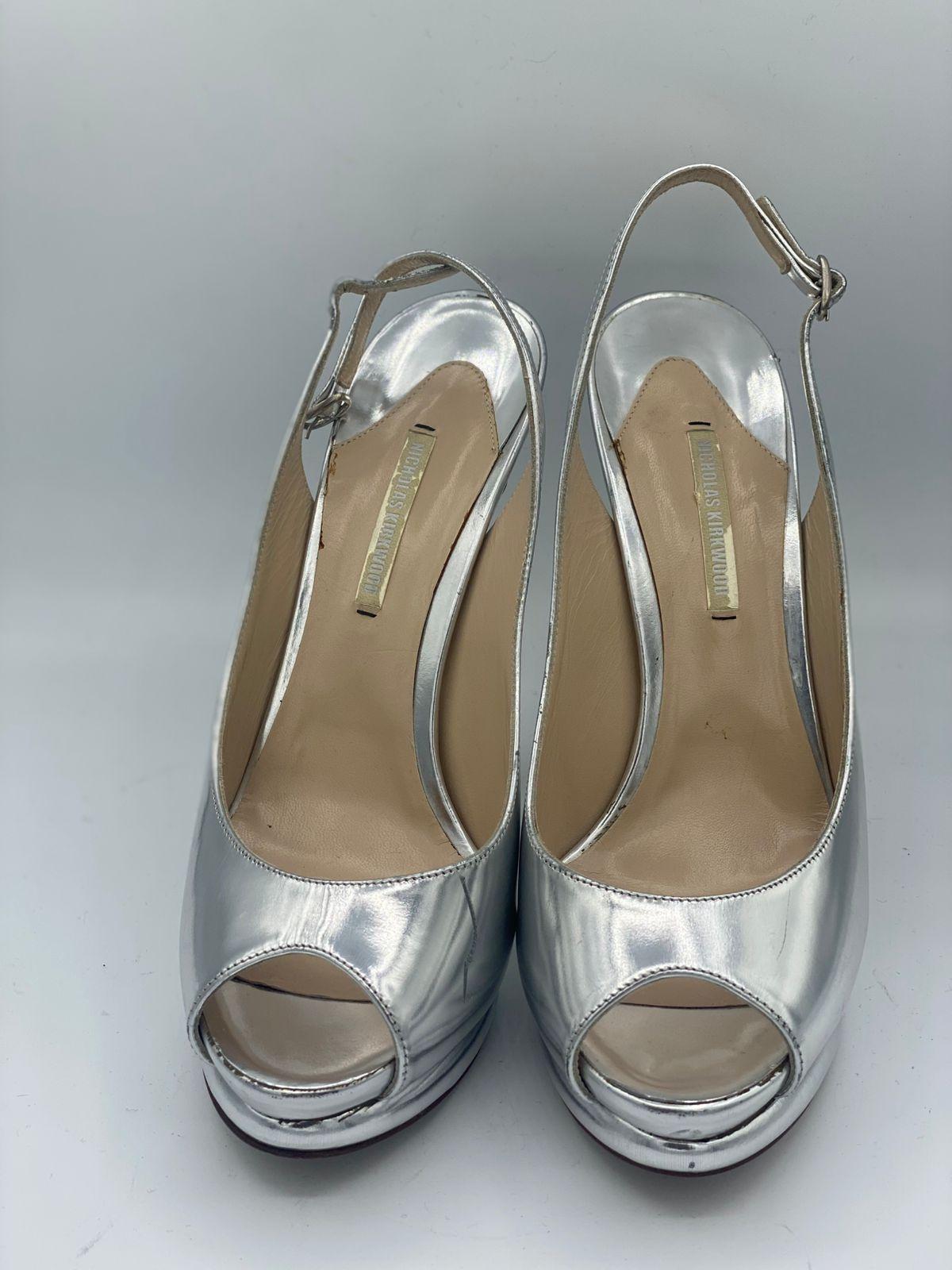 Nicholas Kirkwood
Nicholas Kirkwood Silver Glossy Leather Peep Toe Slingback Sandals thumbnail 2